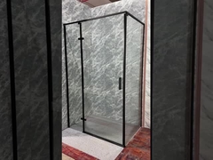 Une salle de douche élégante en aluminium noir et verre transparent